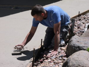 Eco Concrete Crew Finishing A Driveway