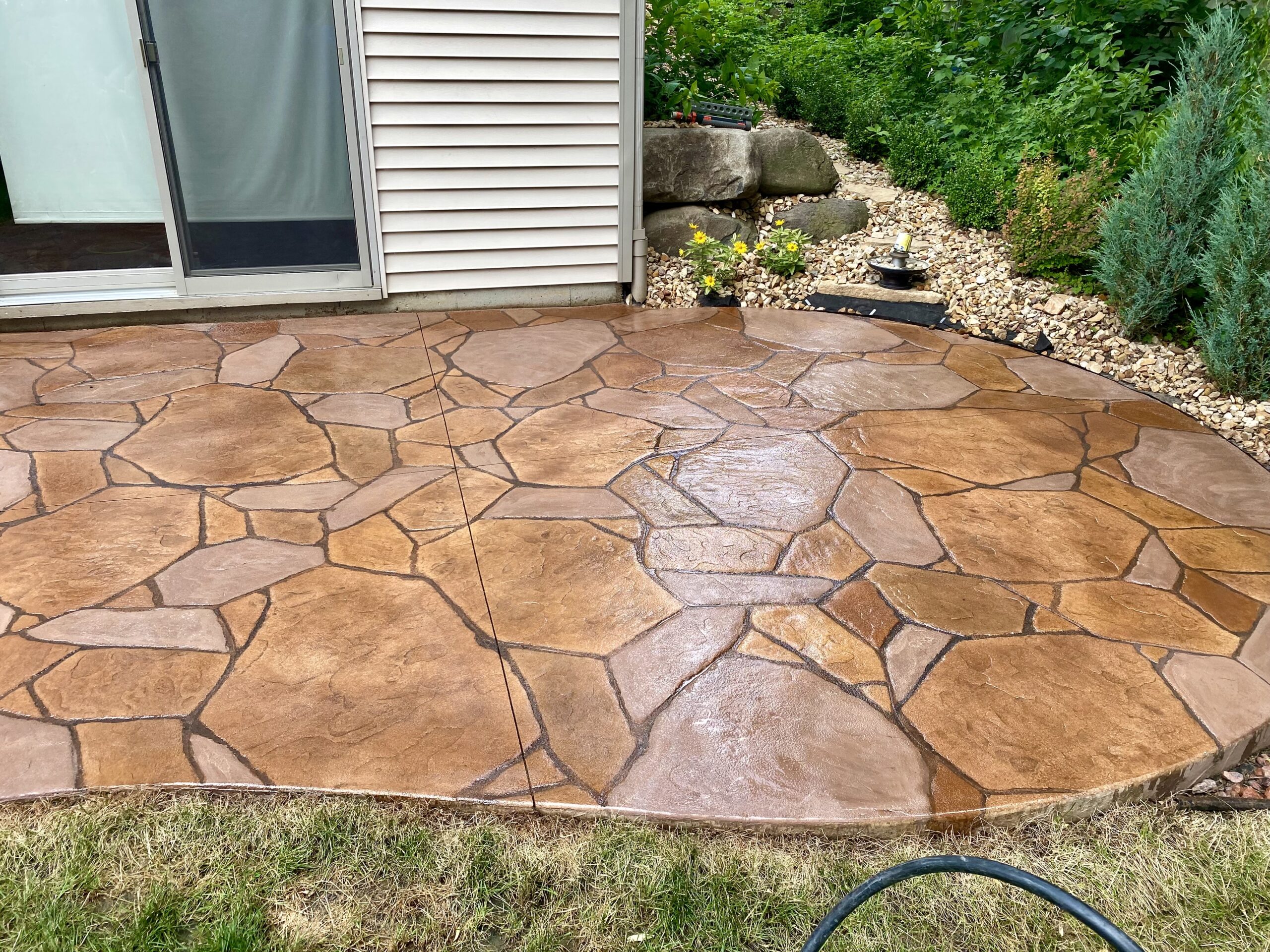 Stamped and Stained Patio by Eco Concrete Company in Madison, WI